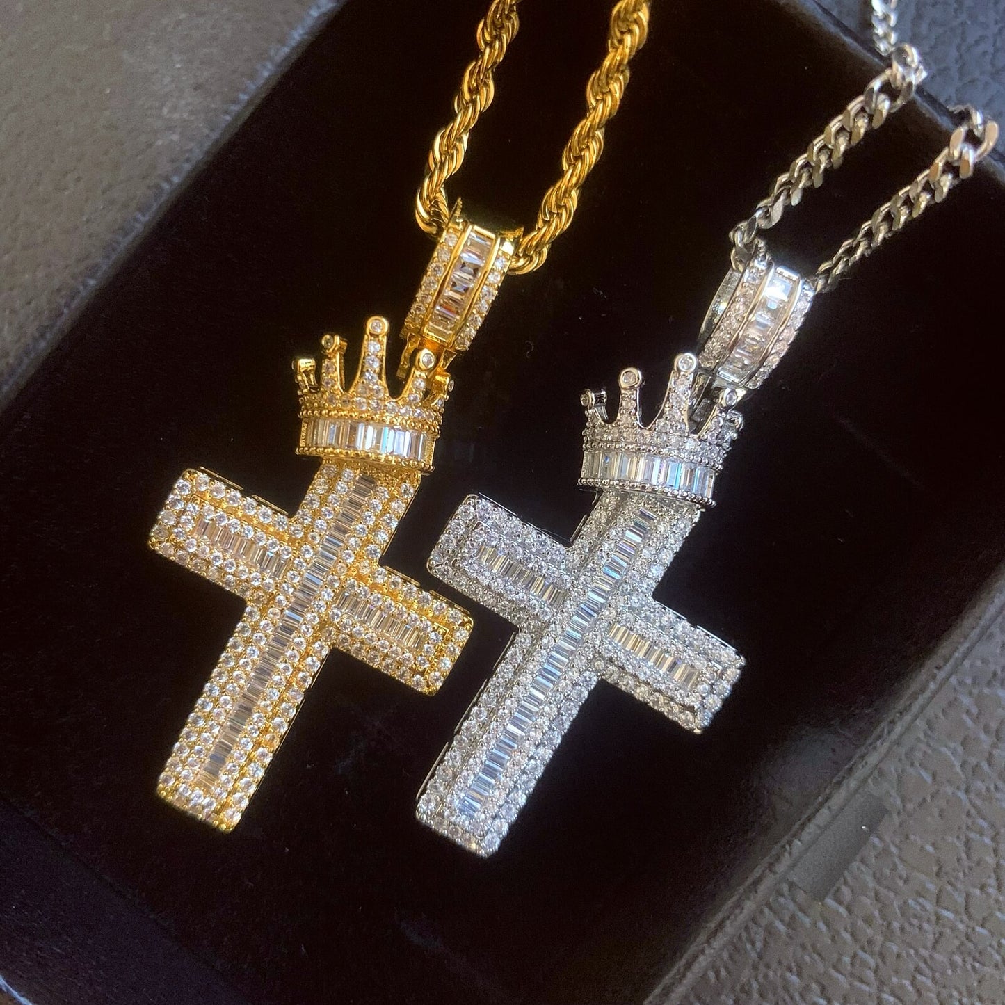 Close-up of STAND TALL crown cross pendant featuring hand-set cubic zirconia
