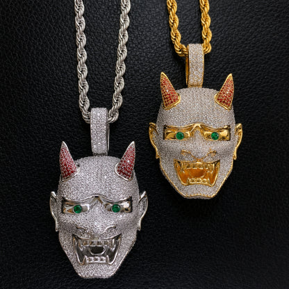 ICEDIAMOND LET LIGHT IN Oni mask pendant necklace with hand-set 5A cubic zirconia and 18K gold plated finish on a stainless steel rope chain.
