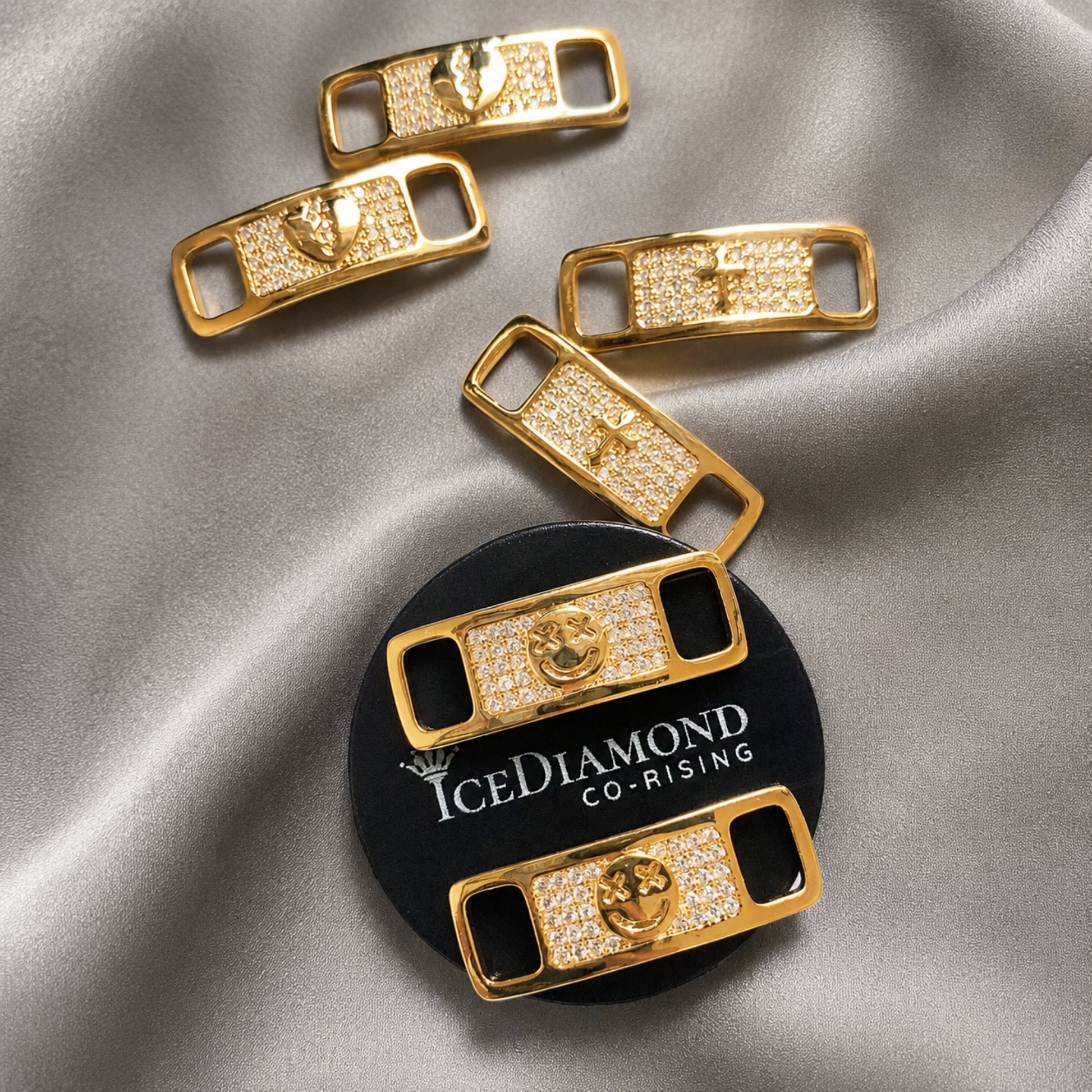 14K gold-plated brass and sparkling AAA-grade cubic zirconia elevate the look of this shoelace jewelry.