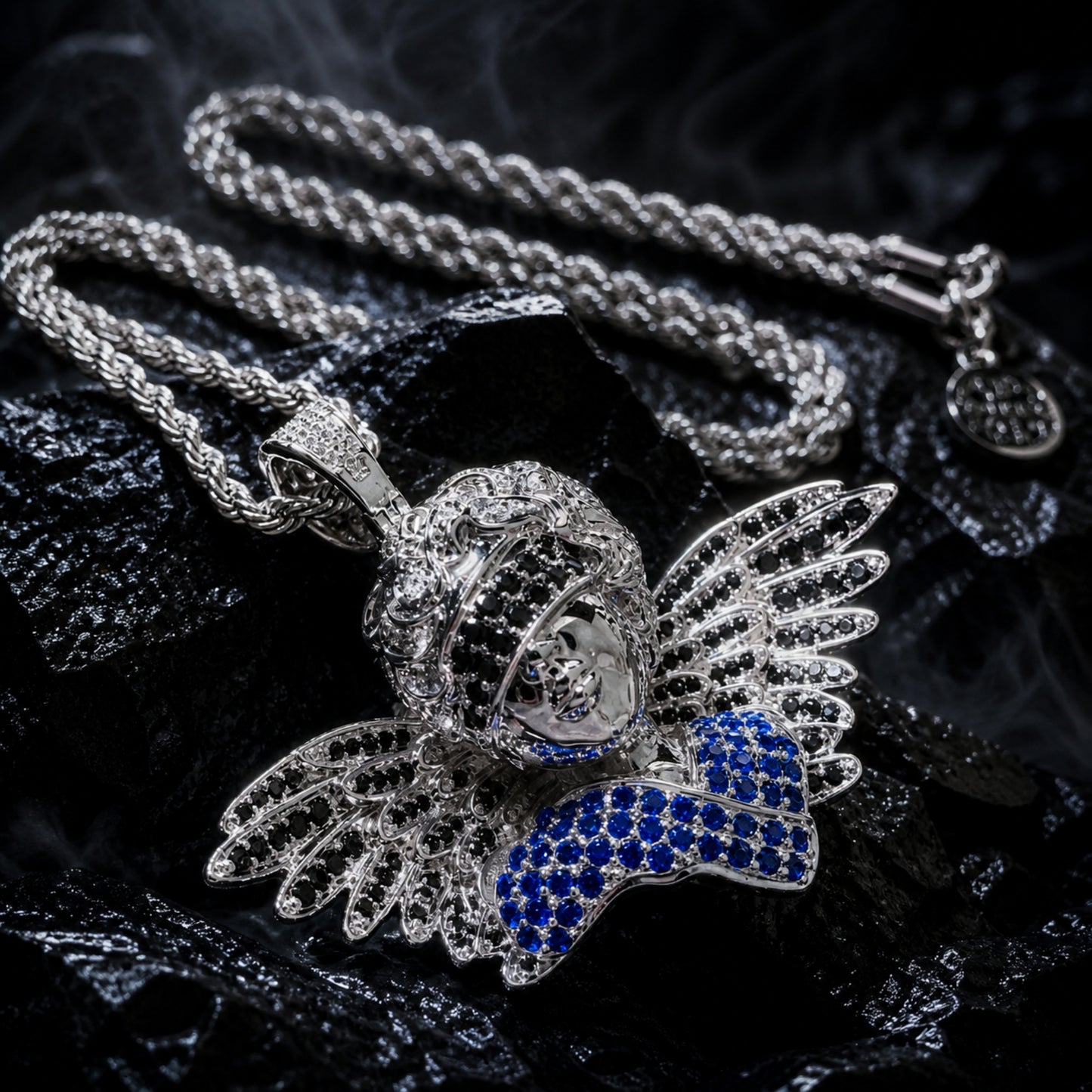 Close-up of TRUST BEYOND SIGHT angel pendant featuring hand-set cubic zirconia
