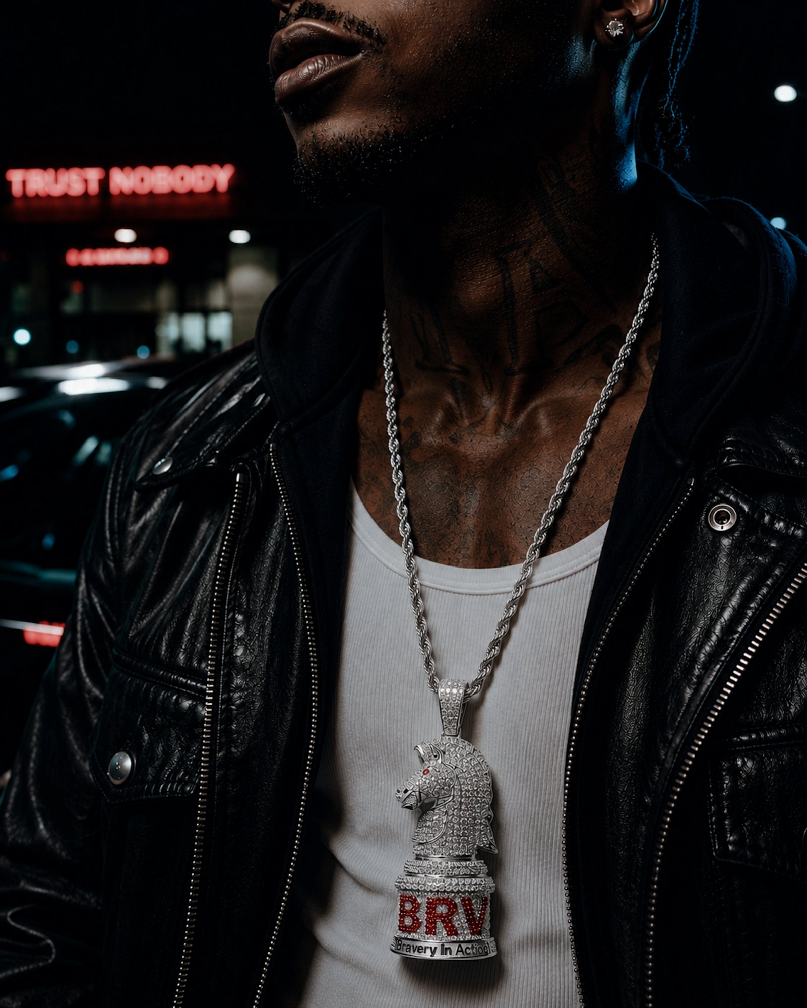 Male model wearing the ICEDIAMOND white gold BRAVERY knight pendant necklace with a streetwear outfit.
