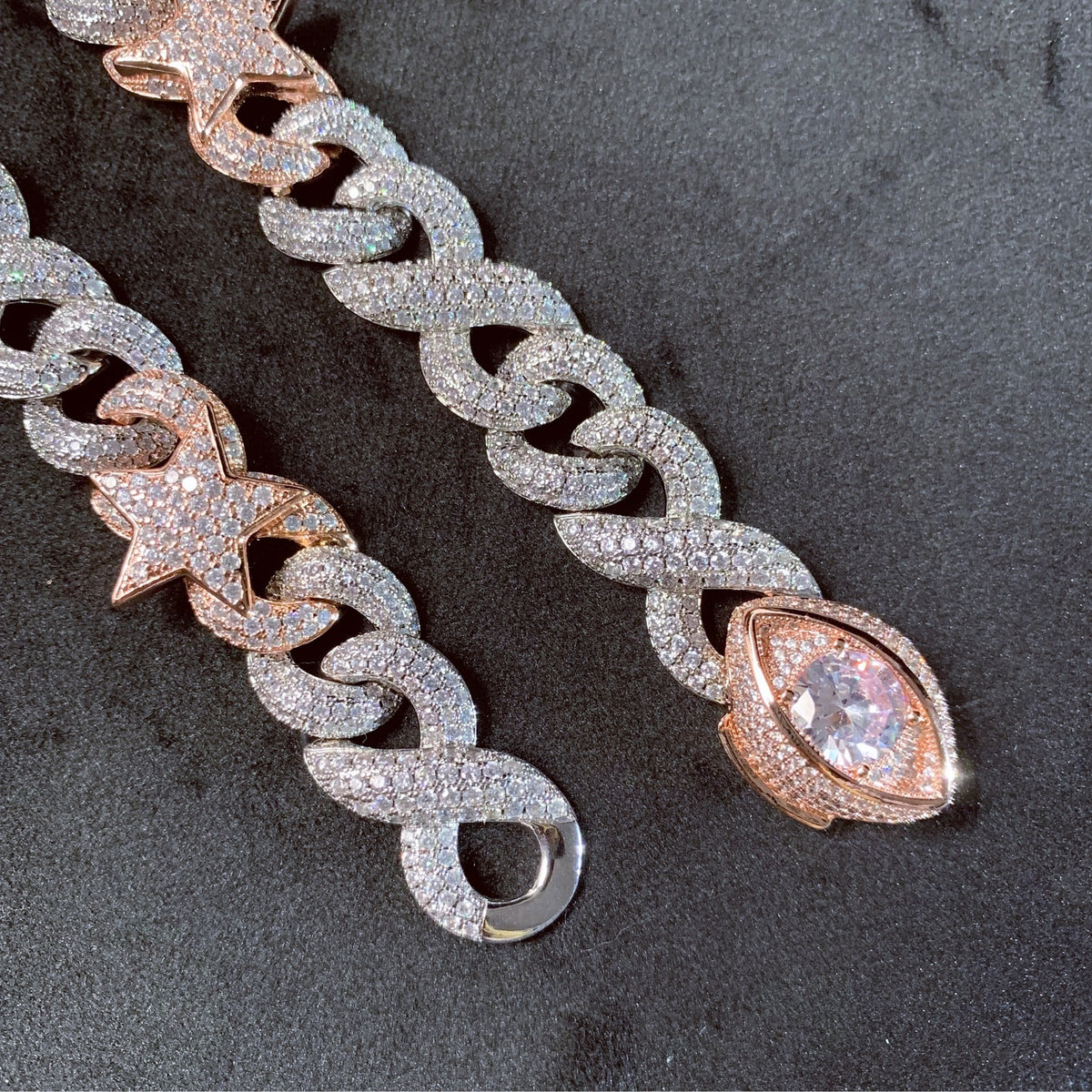 Eye-shaped front clasp with large round cubic zirconia center