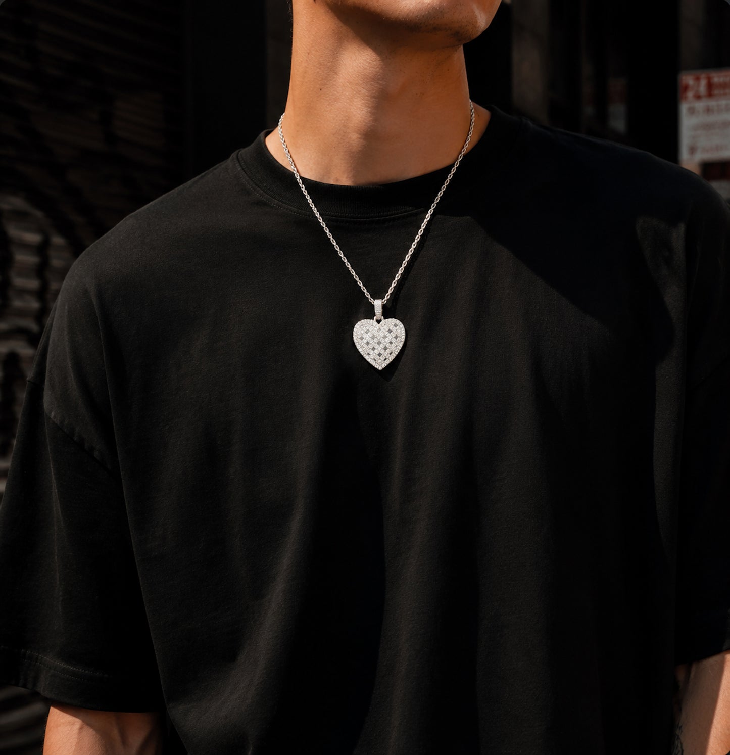 ALL IN iced heart pendant necklace styled as bold unisex streetwear jewelry