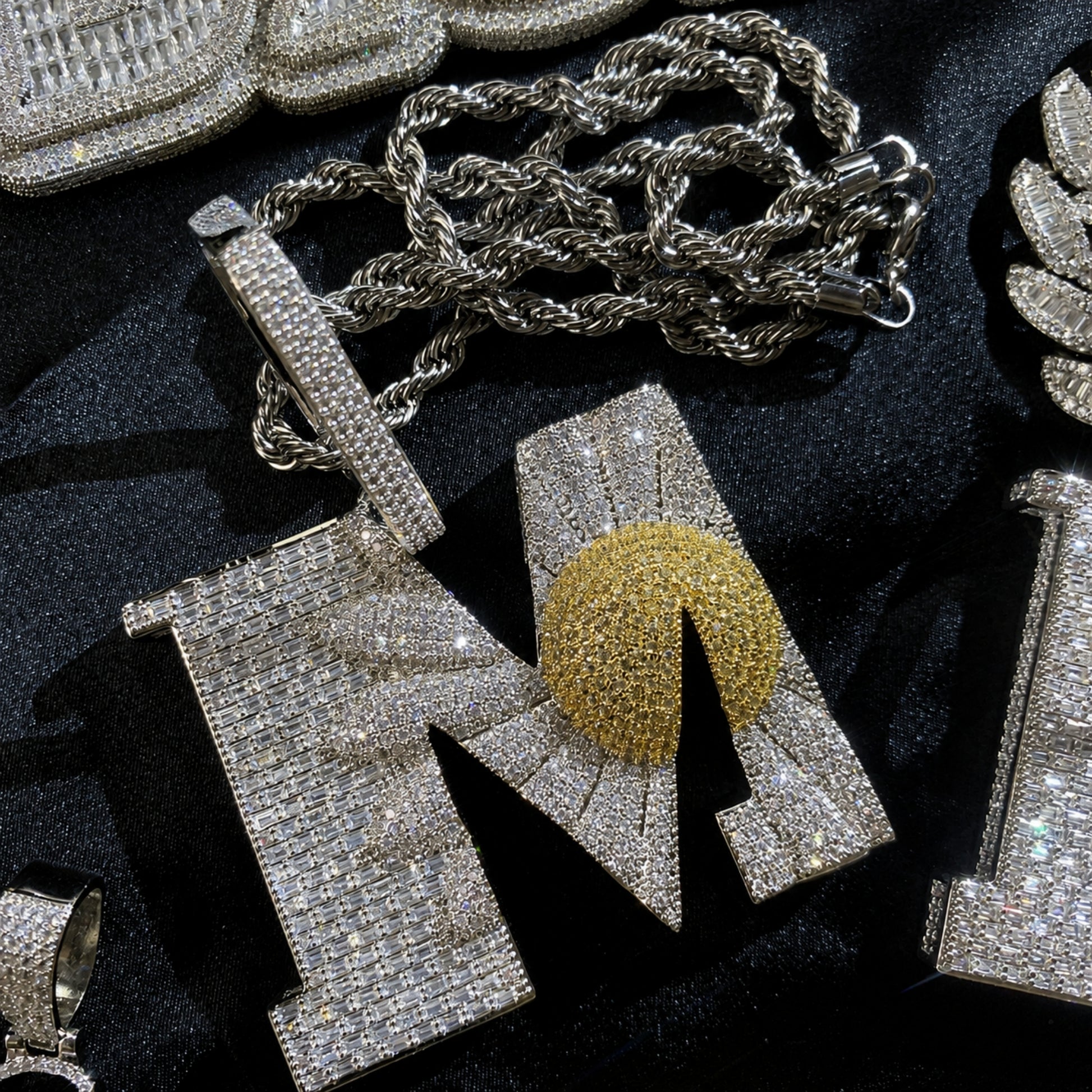 BEGIN AGAIN Letter M Sunrise pendant paired with stainless steel rope chain