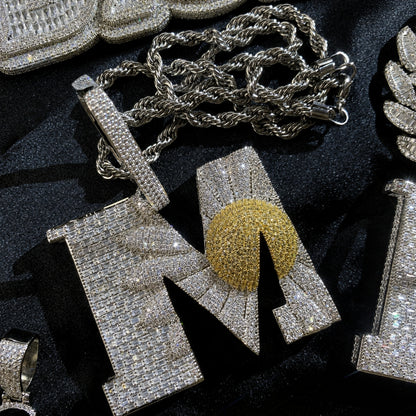 BEGIN AGAIN Letter M Sunrise pendant paired with stainless steel rope chain