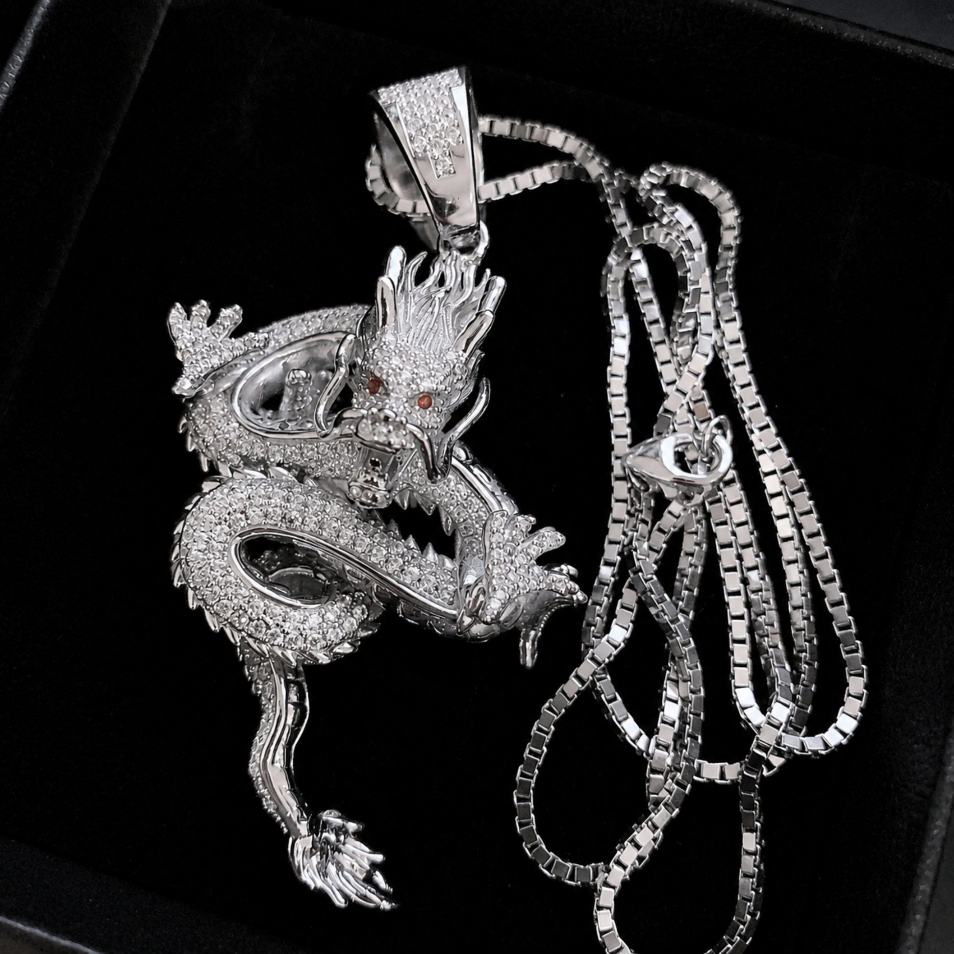 Detailed sculptural craftsmanship of the sterling silver dragon pendant
