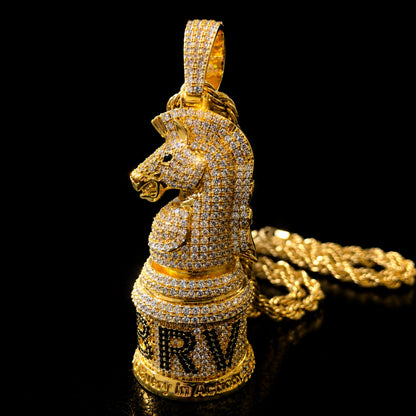 Close-up of the BRAVERY knight pendant showing hand-set 5A cubic zirconia and premium gold-plated craftsmanship.
