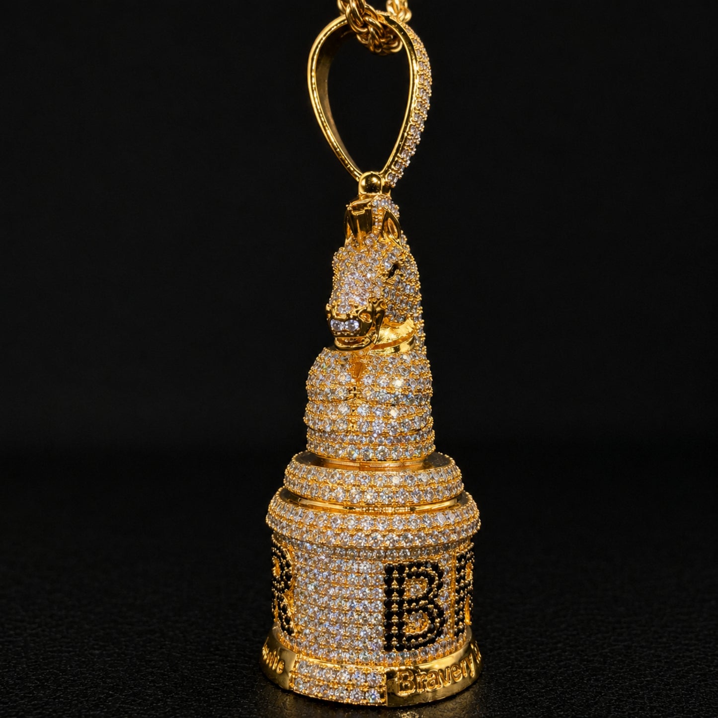 Side profile of the BRAVERY pendant highlighting its sculpted three-dimensional design.
