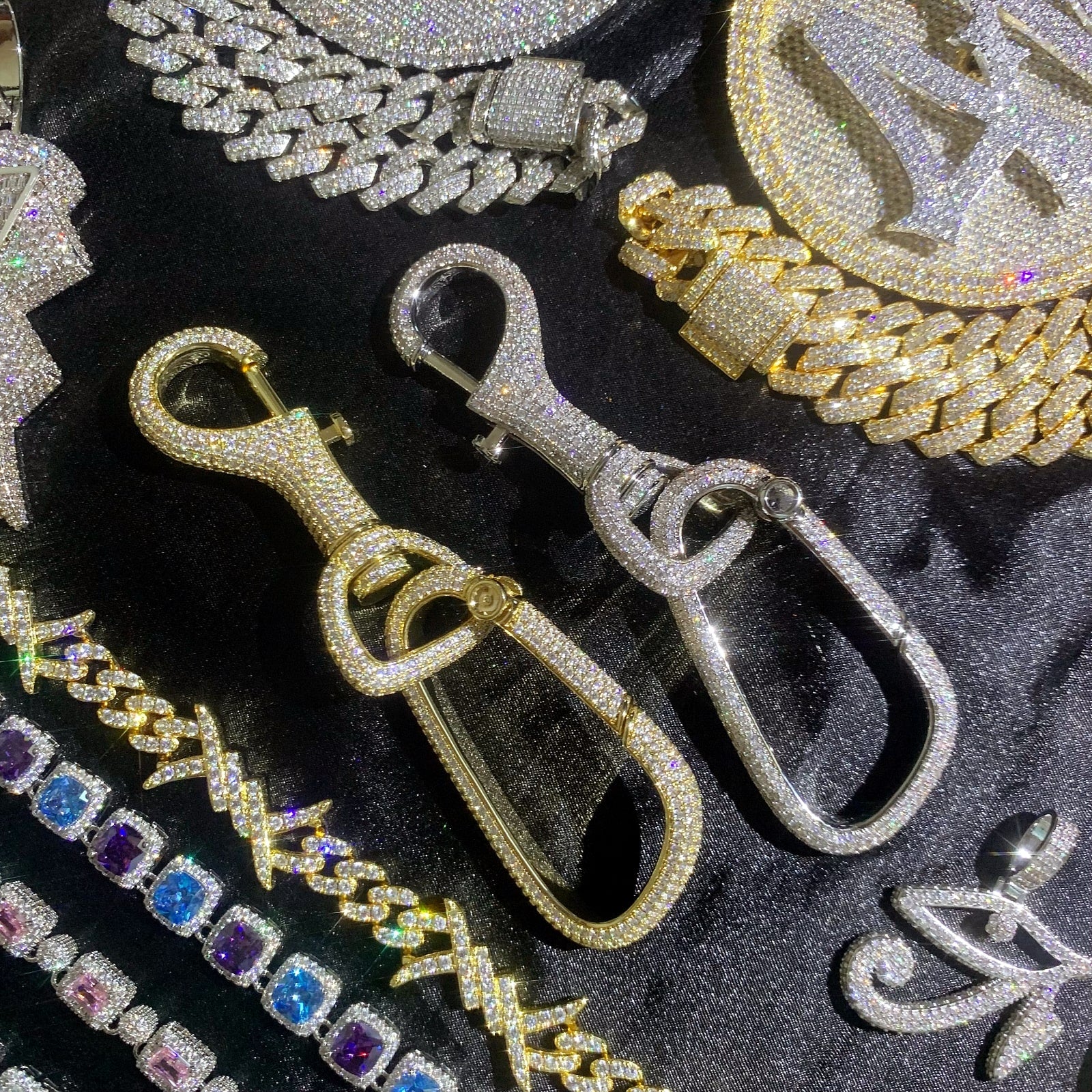 ICEDIAMOND CARRY WITH CONFIDENCE luxury iced out carabiner key clip with 18K gold plating and hand-set cubic zirconia
