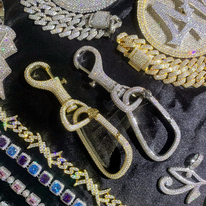 ICEDIAMOND CARRY WITH CONFIDENCE luxury iced out carabiner key clip with 18K gold plating and hand-set cubic zirconia
