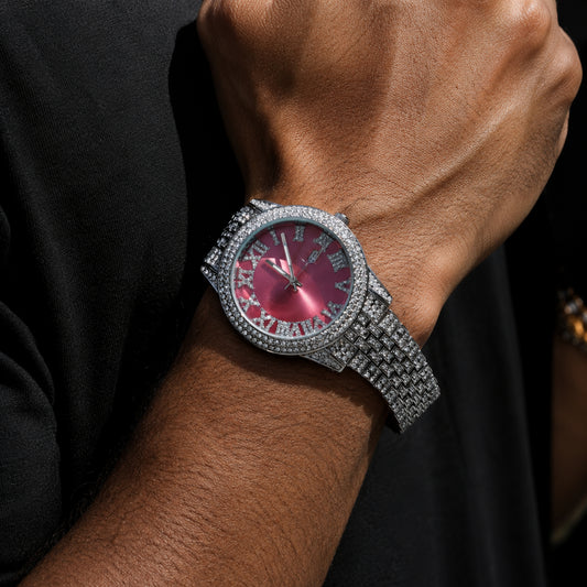Pink dial iced quartz watch with CZ Roman numeral markers