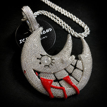 Close-up of the crescent moon pendant with hand-set cubic zirconia
