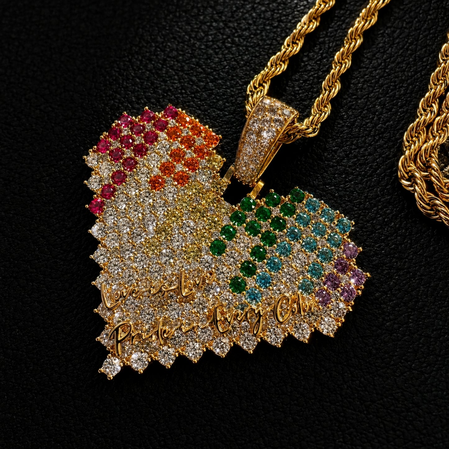 Close-up of ICEDIAMOND rainbow spectrum heart pendant showing colorful hand-set cubic zirconia details

