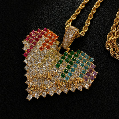 Close-up of ICEDIAMOND rainbow spectrum heart pendant showing colorful hand-set cubic zirconia details
