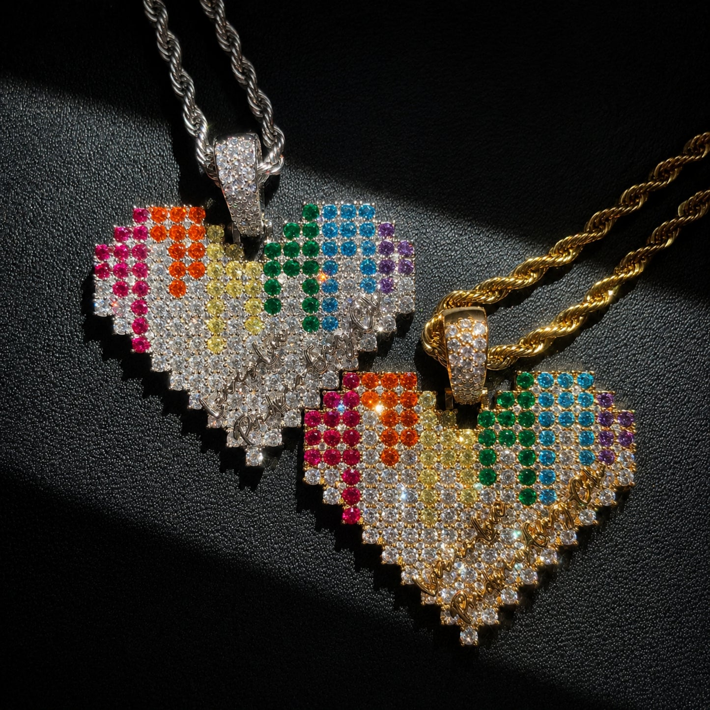 Luxury rainbow heart pendant necklace displayed on a black textured background-shine and stunning
