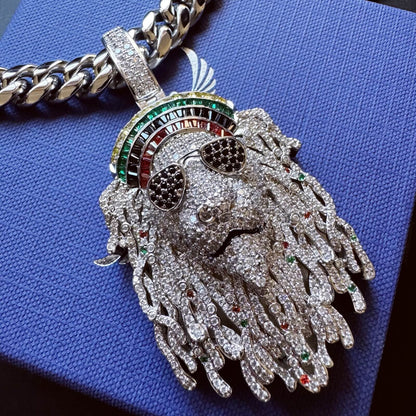 Close-up of pavé sunglasses and detailed facial features on the sculptural pendant
