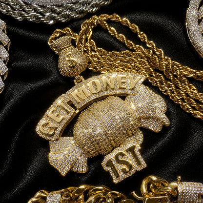 Close-up of the dollar money bag bail and candy pendant craftsmanship
