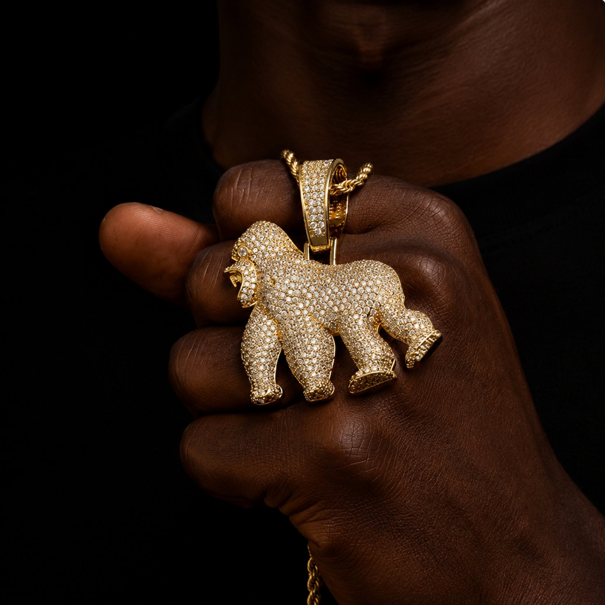 Lifestyle photo of the HOLD YOUR GROUND gorilla pendant necklace with streetwear styling
