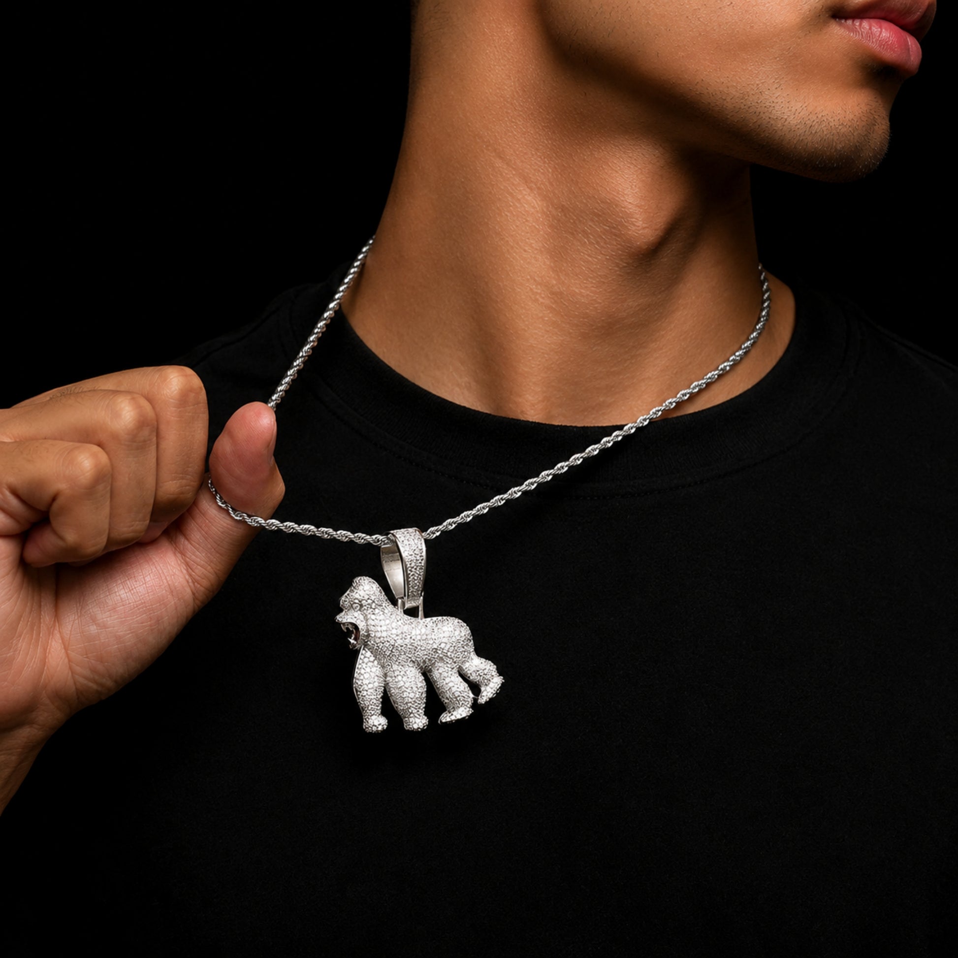 Male model wearing the ICEDIAMOND HOLD YOUR GROUND gorilla pendant necklace
