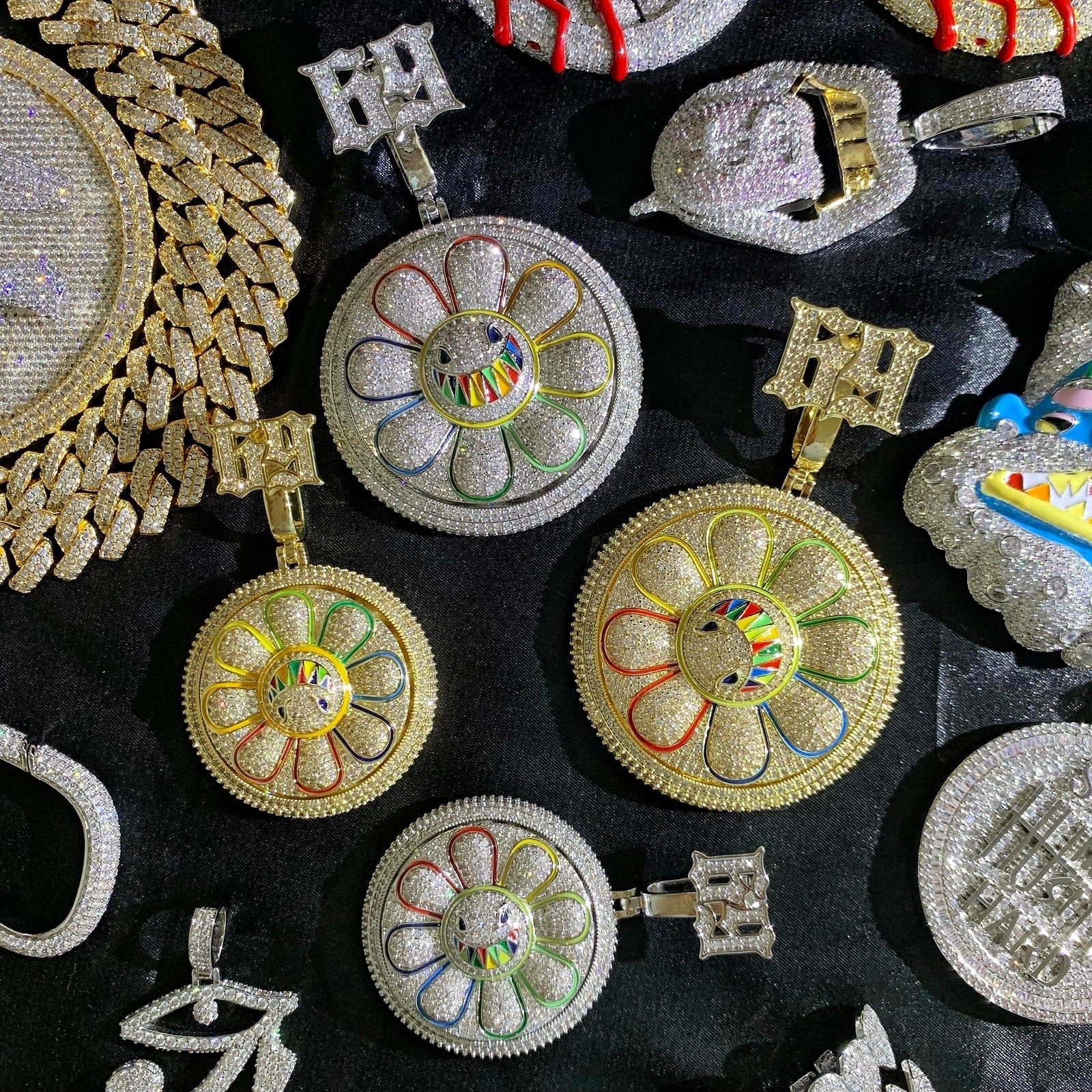 Gold tone and white gold tone CHANGE THE VIEW rotating pendant options