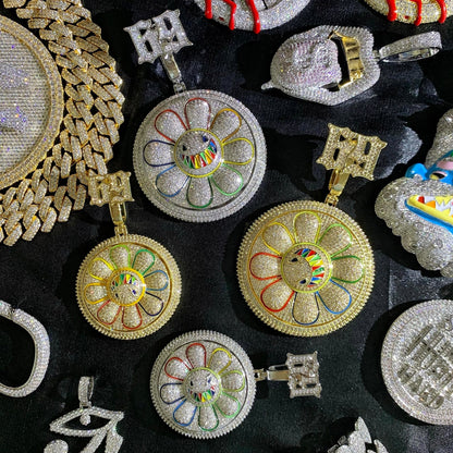 Gold tone and white gold tone CHANGE THE VIEW rotating pendant options