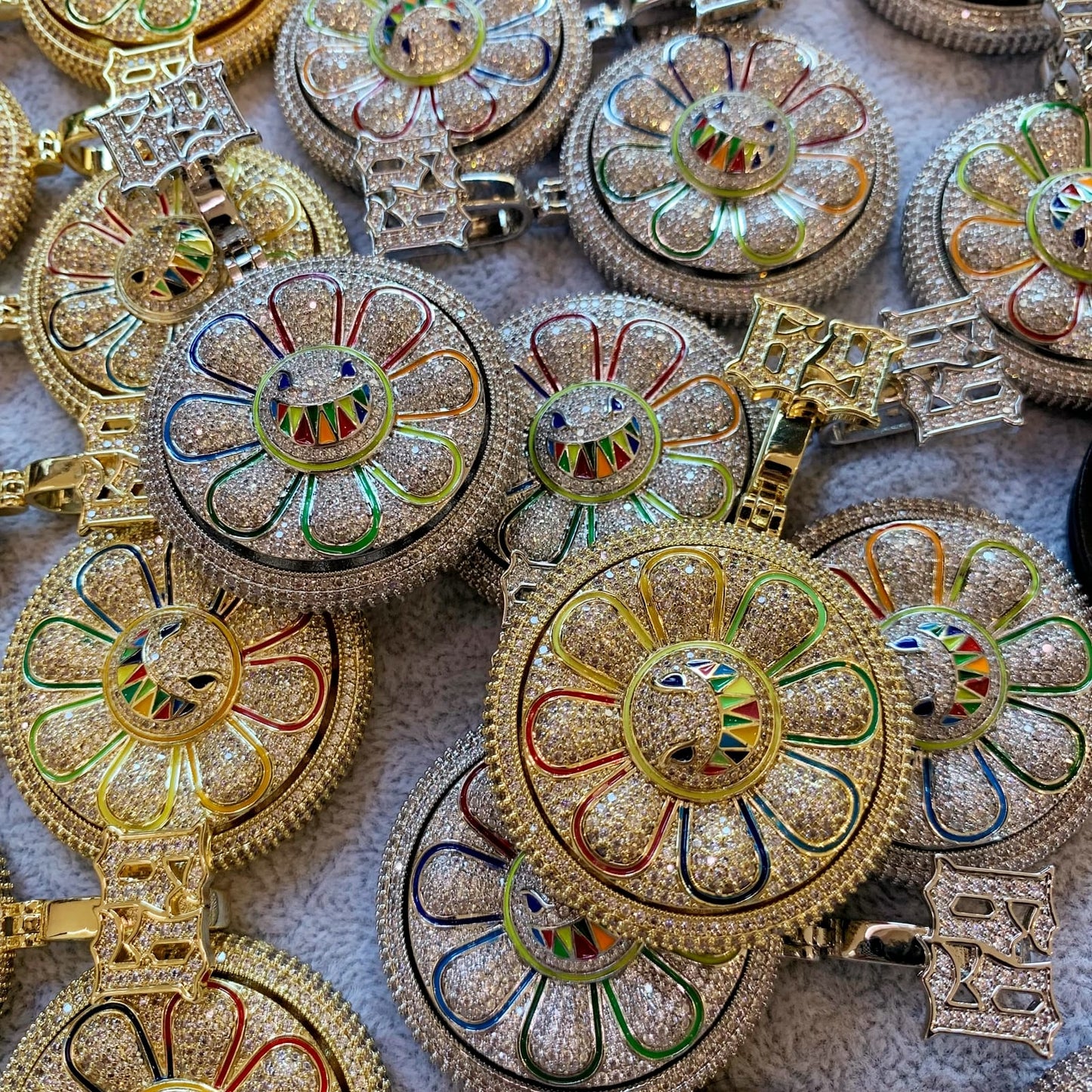 Close-up of rotating upper section on ICEDIAMOND floral medallion pend