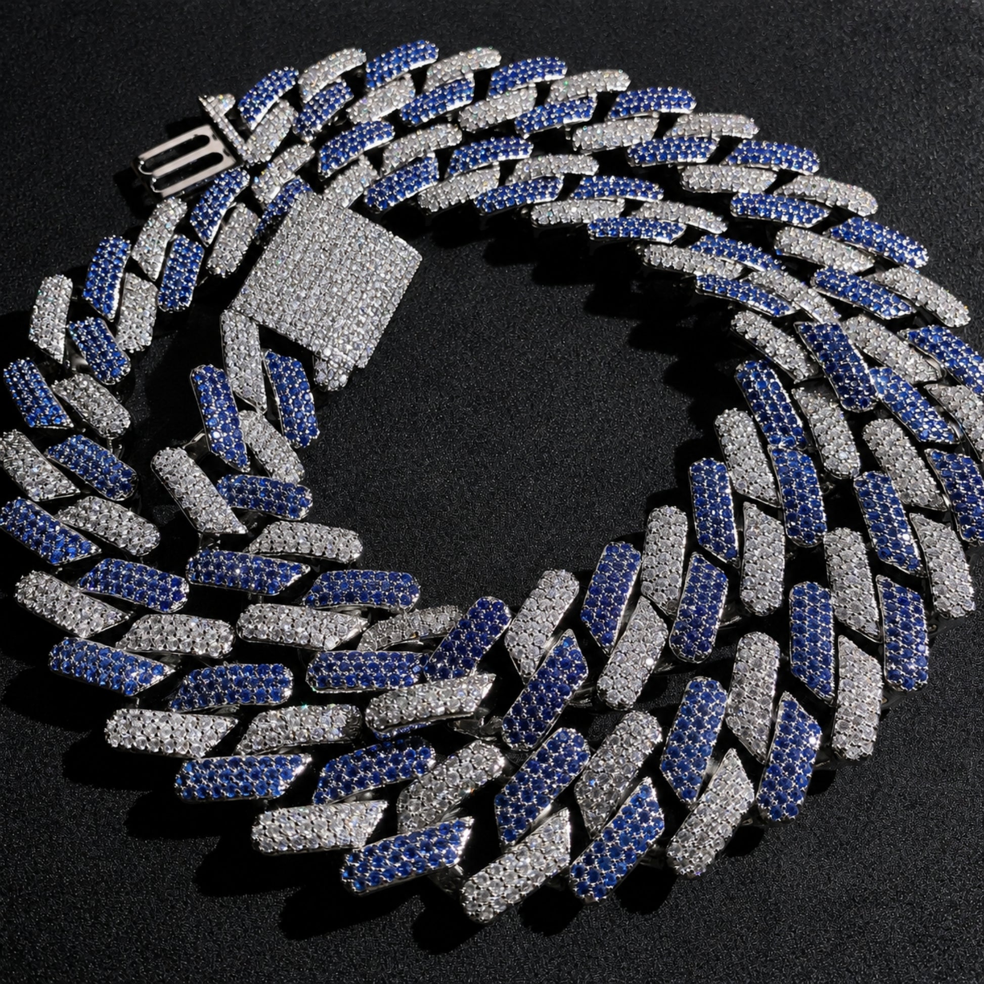 Close-up of the KEEP YOUR COOL Cuban chain showing blue and clear hand-set 5A cubic zirconia.
