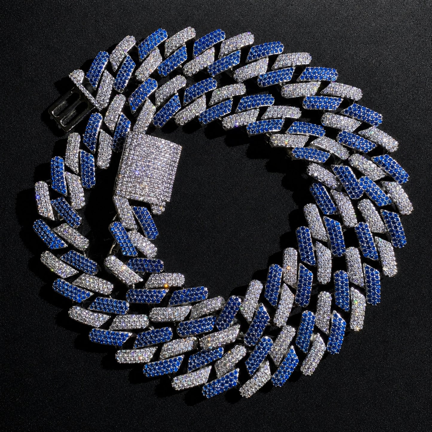ICEDIAMOND KEEP YOUR COOL blue and white iced Cuban chain in 18K white gold plating with hand-set 5A cubic zirconia.
