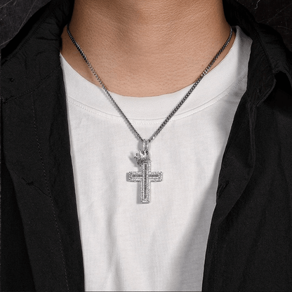 Male model wearing ICEDIAMOND STAND TALL crown cross pendant necklace
