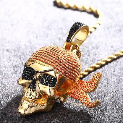 Gold plated pirate skull pendant with red bandana and iced CZ details
