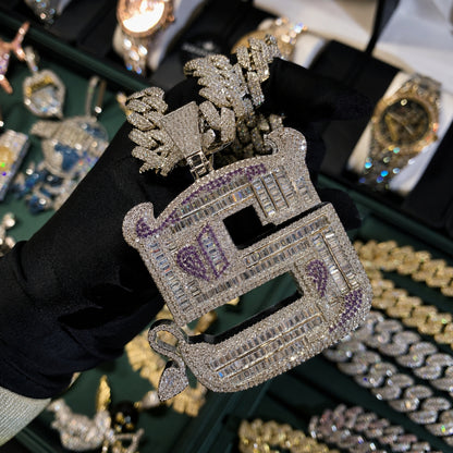 Close-up of the OWN YOUR EDGE Letter S pendant showing hand-set 5A cubic zirconia and polished craftsmanship.
