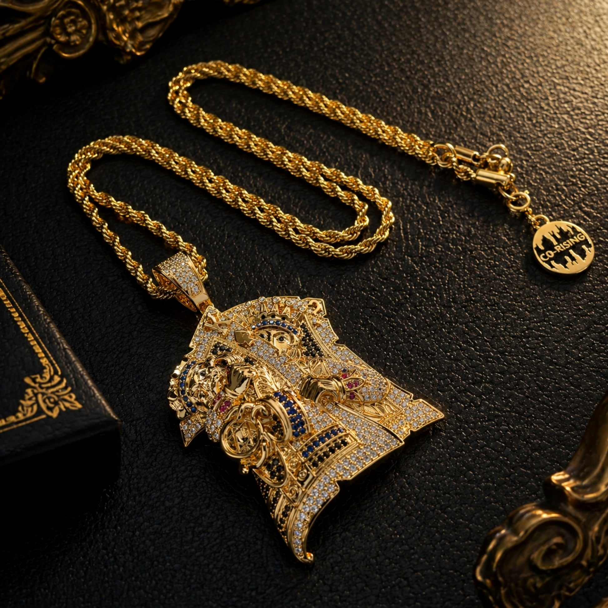 Close-up of the PLAY DIFFERENT pendant showing brilliant hand-set cubic zirconia and premium craftsmanship.
