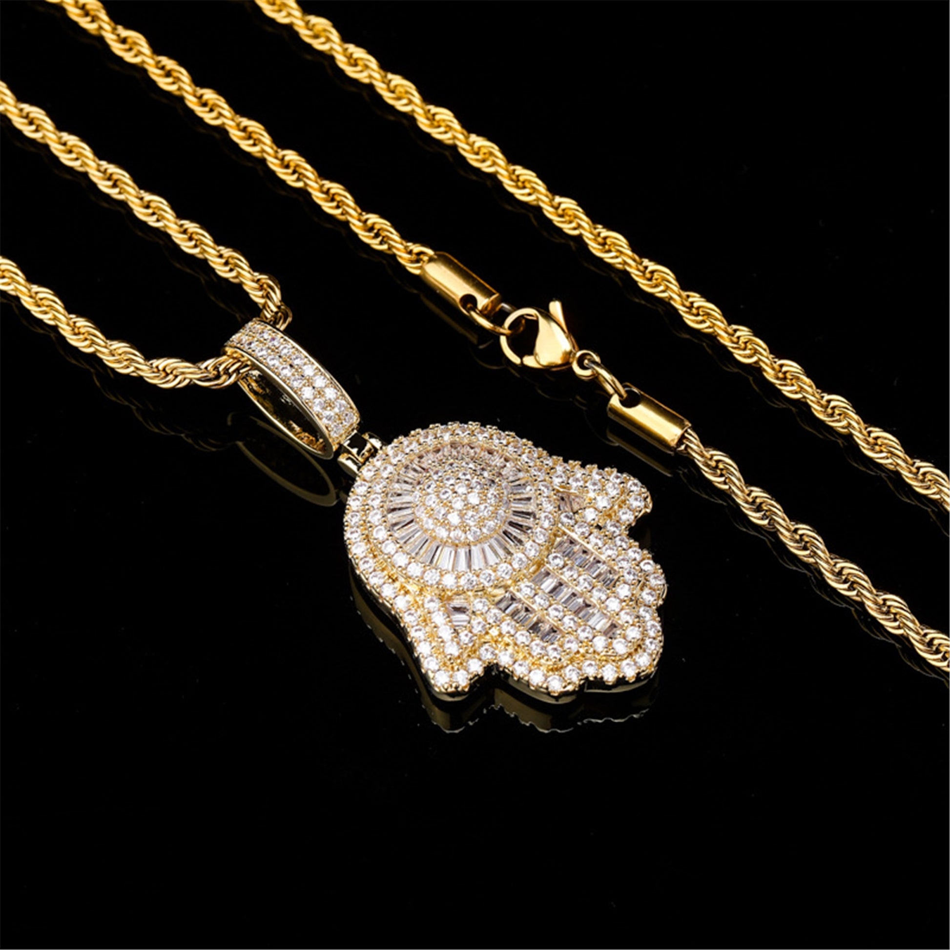 Close-up of round and baguette cubic zirconia on SAFE HARBOR pendant
