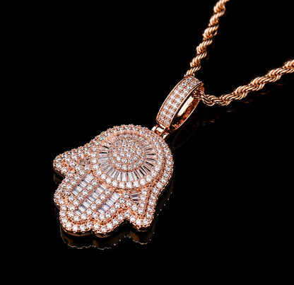 Angled view of the SAFE HARBOR Hamsa Hand pendant with rope chain
