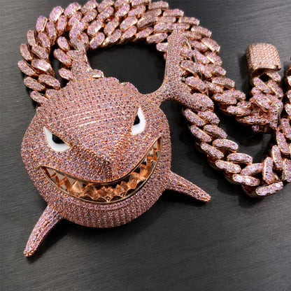 Rose gold finish and pavé craftsmanship of the pink shark pendant
