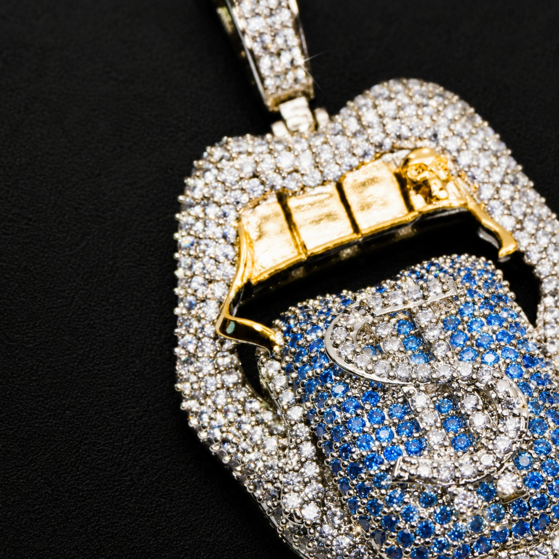Dollar tongue pendant with fancy light blue cubic zirconia
