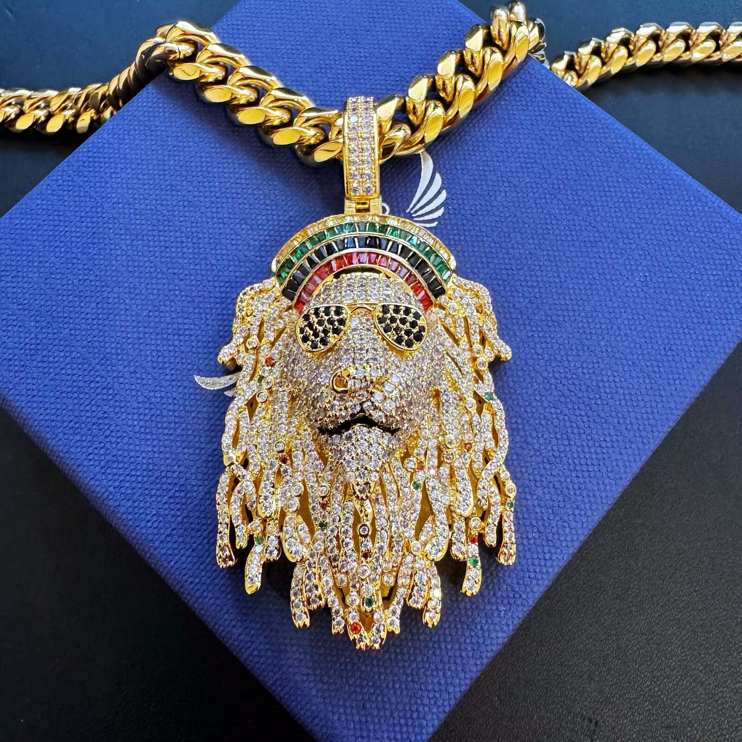 18k gold plated STAY TRUE pendant with sculpted dreadlocks and hand-set cubic zirconia