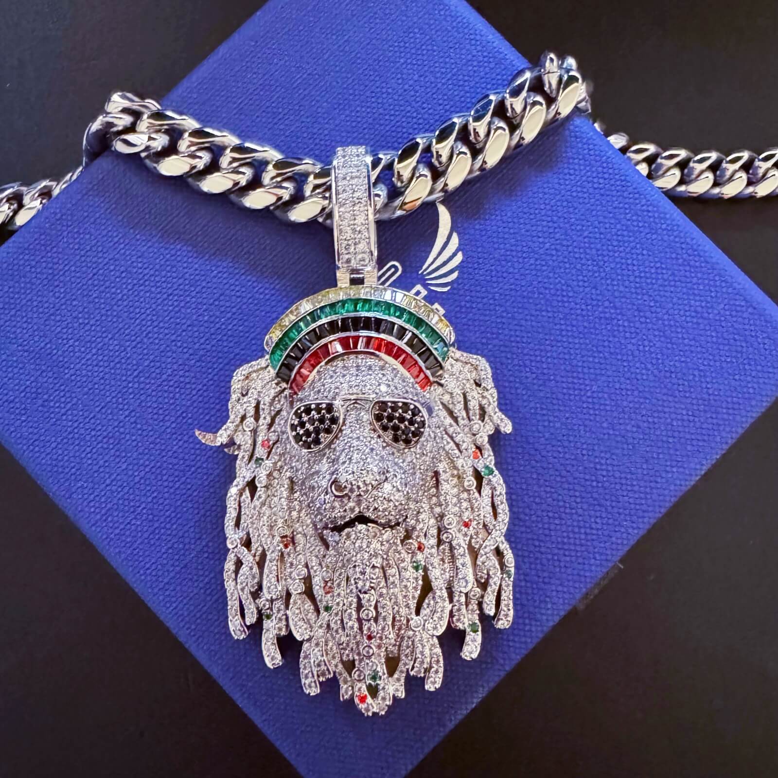 ICEDIAMOND STAY TRUE sculptural dreadlock pendant necklace with a glossy Cuban chain
