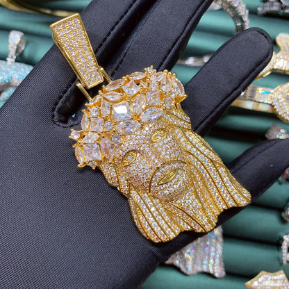 Close-up of hand-set cubic zirconia on the Jesus head pendant
