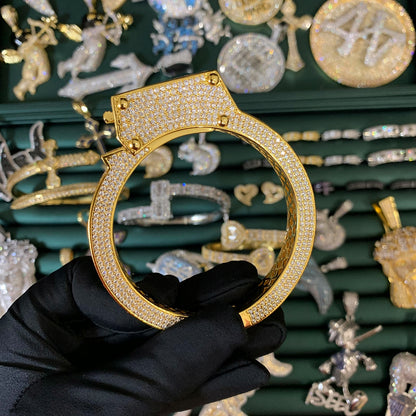 Side profile of the LIVE UNBOUND statement bangle bracelet with brilliant cubic zirconia detailing.
