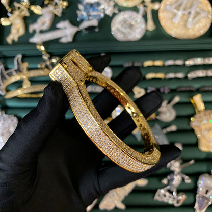 Side profile of the LIVE UNBOUND statement bangle bracelet with brilliant cubic zirconia detailing.
